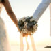 Couple holding hands after marriage