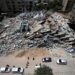 Palestinians building tower after the Israeli airstrikes on Gaza